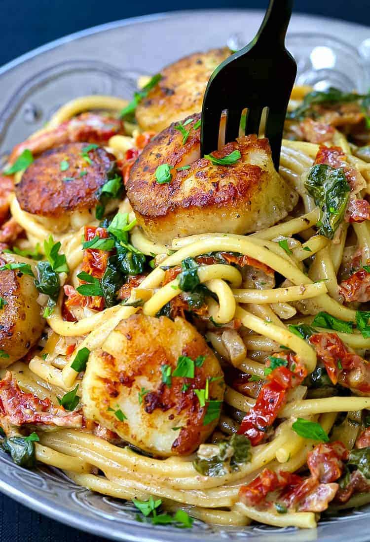 Creamy Tuscan Spaghetti with Jumbo Scallops is a scallop recipe with pasta in a creamy sauce with spinach