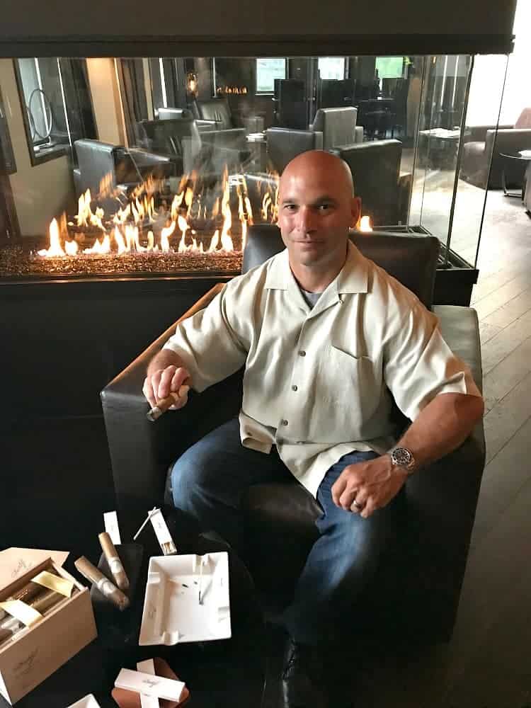 Dan by fire at cigar lounge