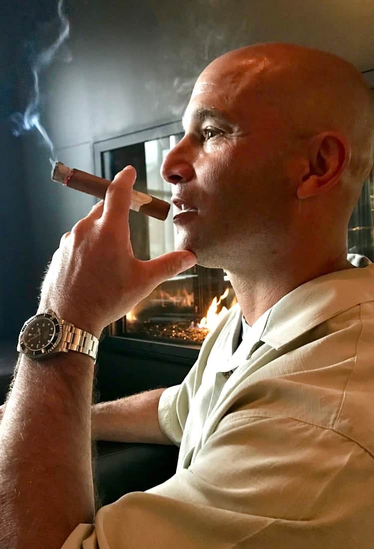 Dan smoking cigar