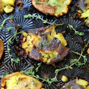 Stick of Butter Smashed Potatoes on a baking sheet