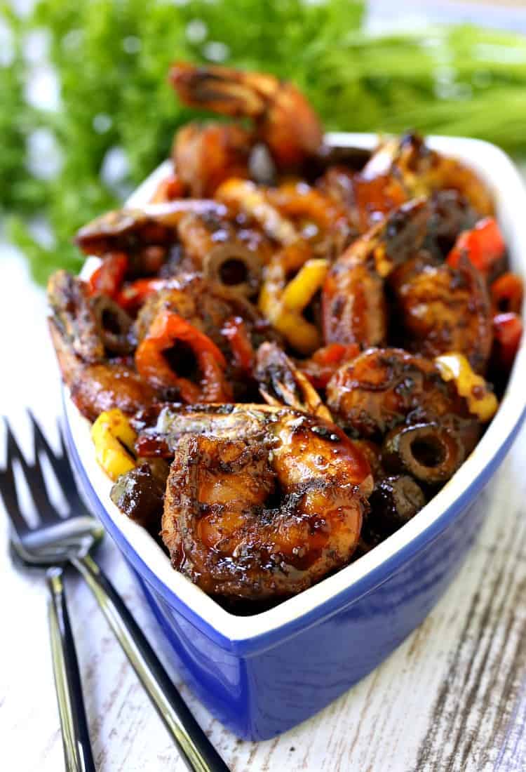 Shrimp recipe with forks in a blue bowl