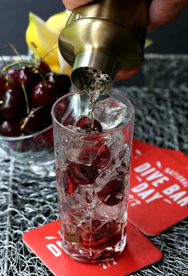 A Cherry Bomb 7 & 7 is a twist on the classic 7 & 7 with cherry liquor and cherries