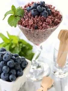 RumChata Fresh Blueberry Granita with mint and blueberries in a glass