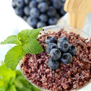 RumChata Fresh Blueberry Granita in a glass with mint garnish