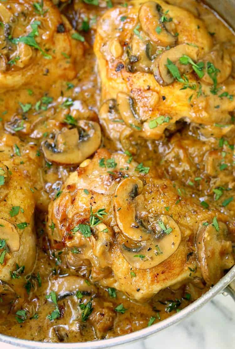 Creamy Caramelized Onion Chicken Thighs is a one skillet diner with mushrooms and onions