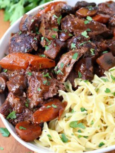 French Bistro Beef Stew in a bowl with noodles and vegetables