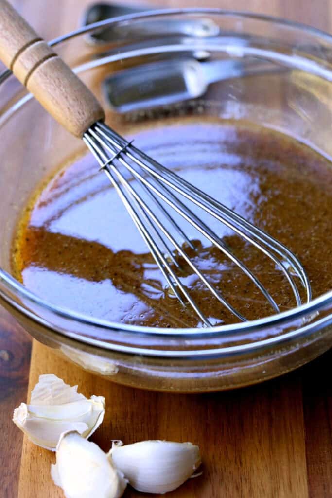 marinade in a glass bowl with whisk