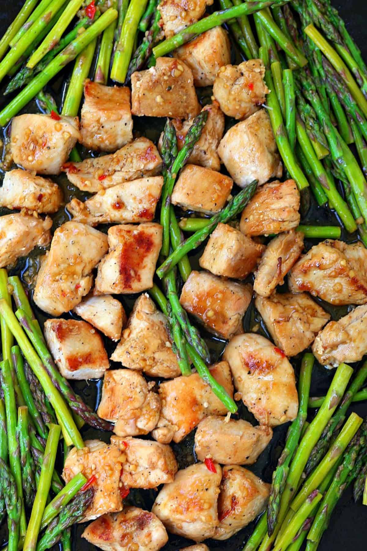 chicken and asparagus on a sheet pan