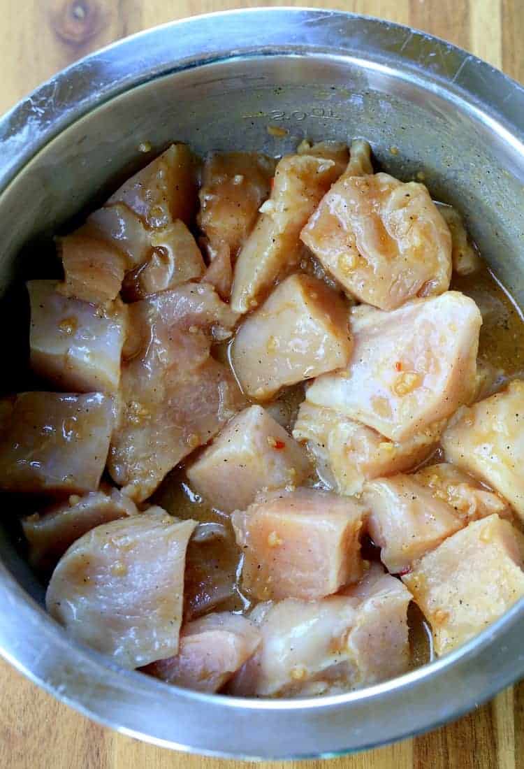 chicken marinating for sheet pan chicken