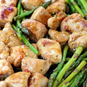 Sheet Pan Lemon Garlic Chicken and Asparagus close up in pan