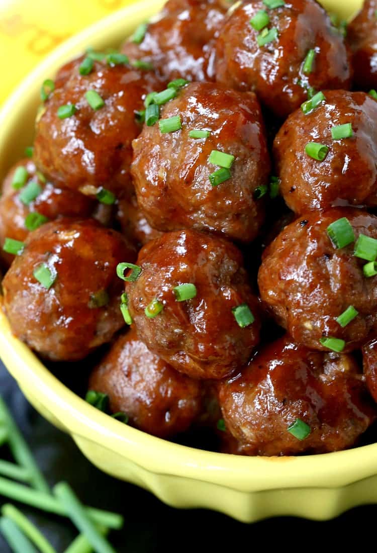 mustard glazed cocktail meatballs with scallions on top