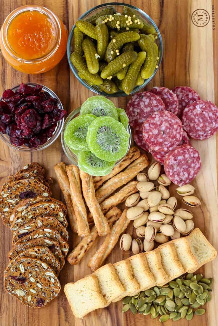 How To Make A Cheese Board using cheese, meats and a few sweet treats