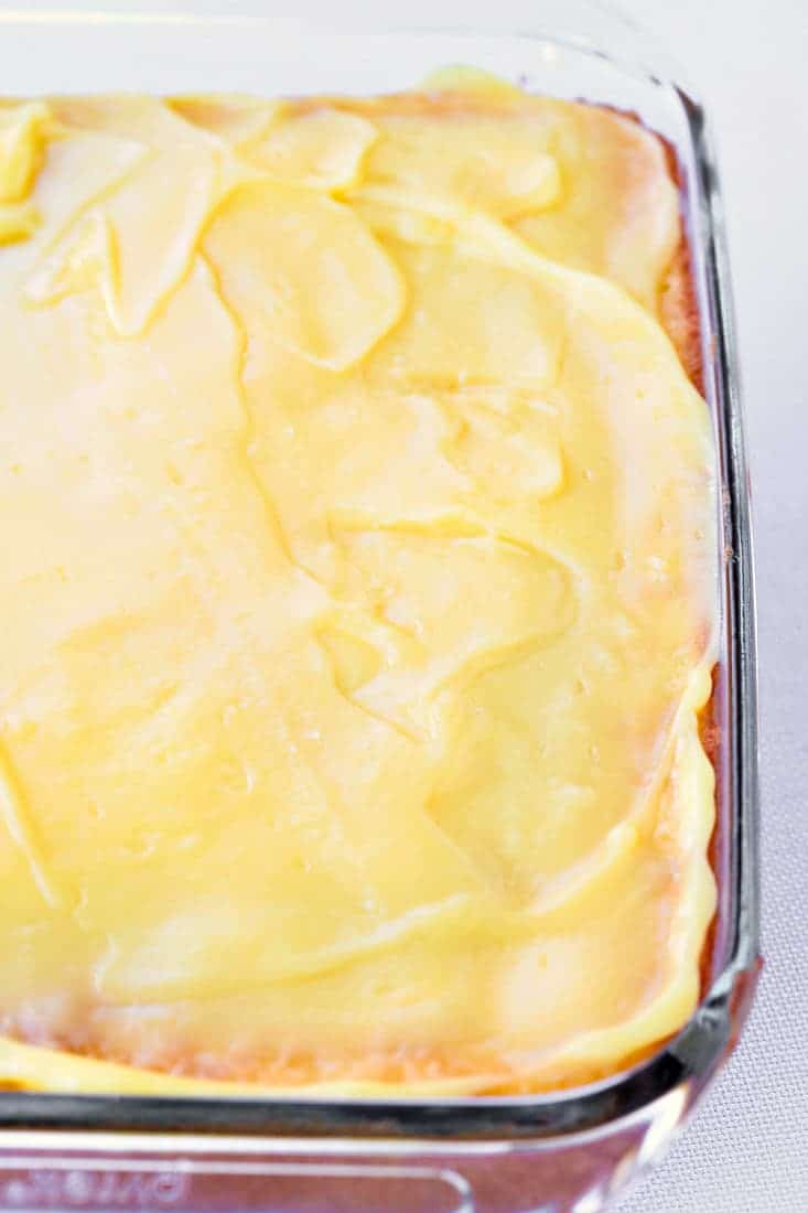 Banana Bourbon Poke Cake is a boxed cake recipe that pokes holes in the cake and covers it with pudding