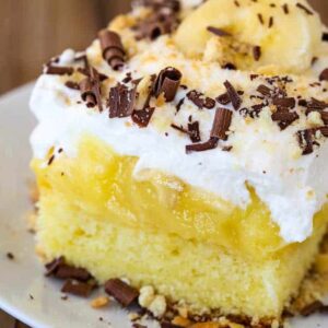 Banana Bourbon Poke Cake is an easy poke cake recipe with bananas and bourbon