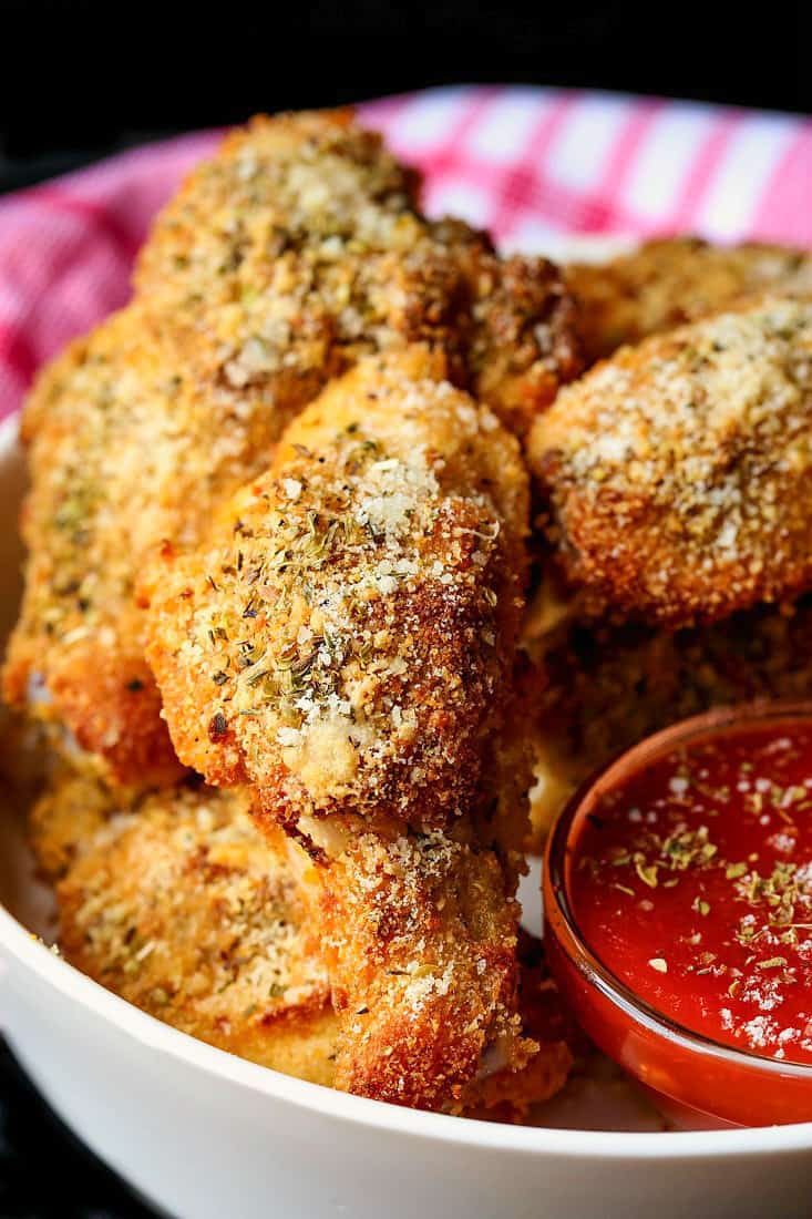 These Baked Chicken Wings are the crispiest oven baked wings ever! A crispy parmesan-panko crust coats tender and juicy chicken wings! Easy Crispy Baked Chicken Wings Recipe