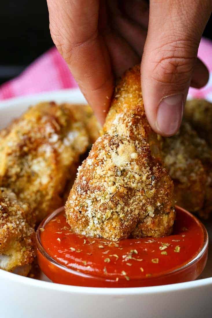 These Baked Chicken Wings are the crispiest oven baked wings ever! A crispy parmesan-panko crust coats tender and juicy chicken wings! Best Crispy Baked Parmesan Chicken Wings
