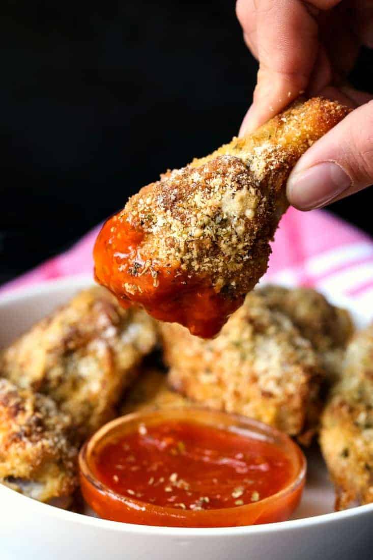 These Baked Chicken Wings are the crispiest oven baked wings ever! A crispy parmesan-panko crust coats tender and juicy chicken wings! Crispy Baked Chicken Wings Recipe