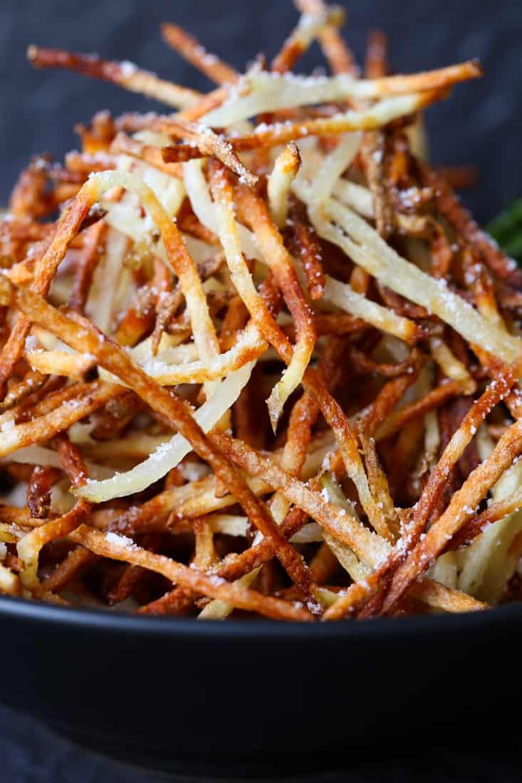 Homemade Shoestring French Fries is a french fry recipe that's made three ways, perfect for appetizers or a side dish