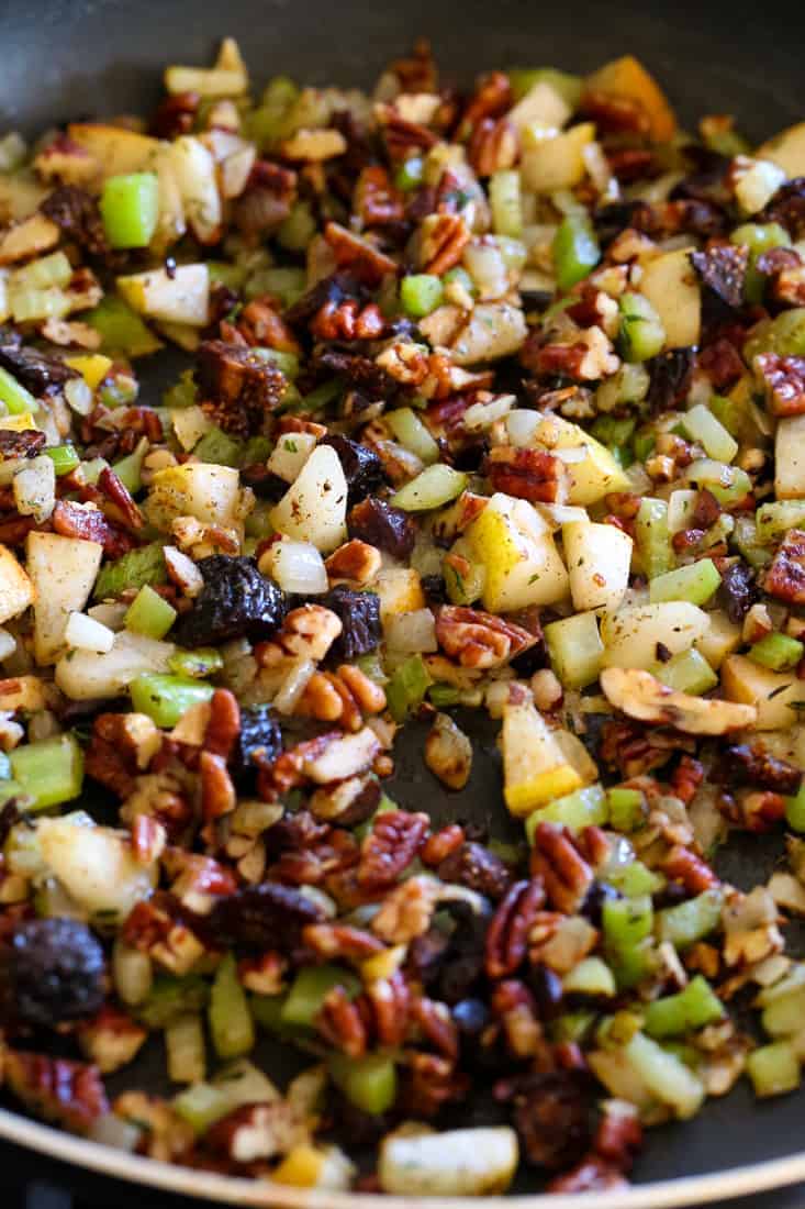 The Best Vegetarian Stuffing for your Thanksgiving dinner! Our recipe has figs, pears and crunchy pecans to make it extra delicious. Easy Thanksgiving Stuffing Recipe