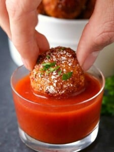 Pepperoni Pizza Arancini is a rice ball appetizer recipe served with marinara sauce