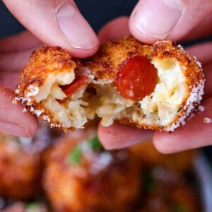 Pepperoni Pizza Arancini is a rice ball recipe with pepperoni and cheese in the center