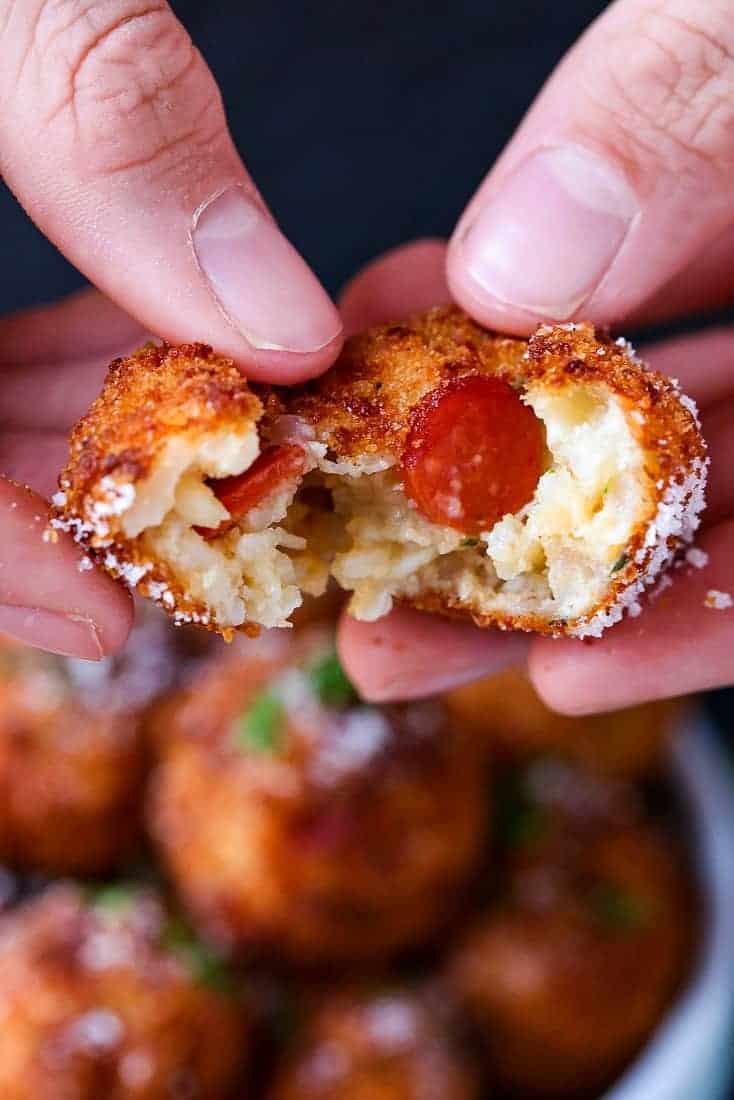 Pepperoni Pizza Arancini is a rice ball recipe with pepperoni and cheese in the center