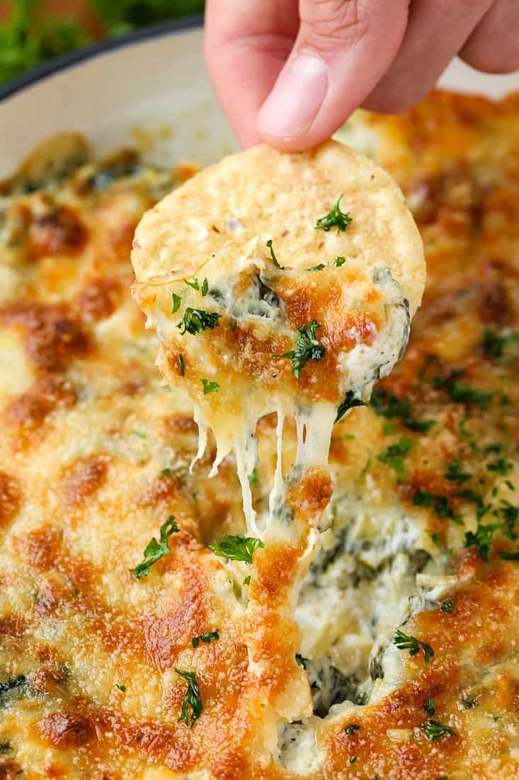 Spinach Artichoke Dip is a spinach dip with three kinds of cheese