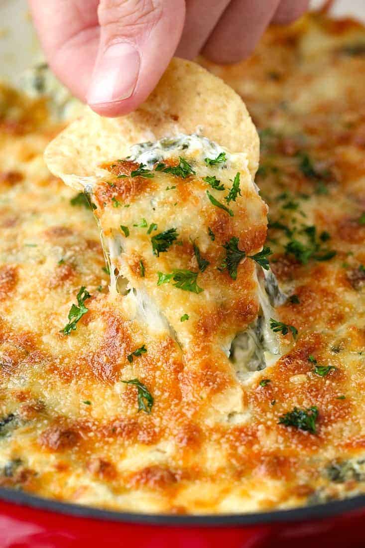 Spinach Artichoke Dip is a baked spinach dip with three kinds of cheese