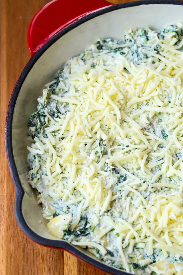 Spinach Artichoke Dip is a hot dip recipe topped with mozzarella and parmesan cheese