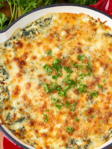 Skillet Spinach Artichoke Dip is a hot spinach dip recipe topped with cheese