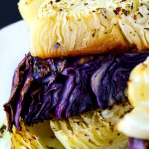 Oven Roasted Cabbage Recipe is made with purple and green cabbage