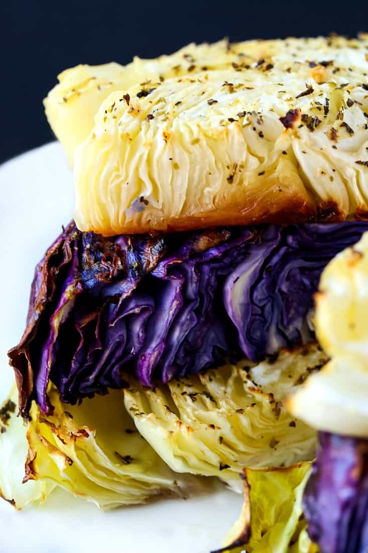 Oven Roasted Cabbage Recipe is made with purple and green cabbage