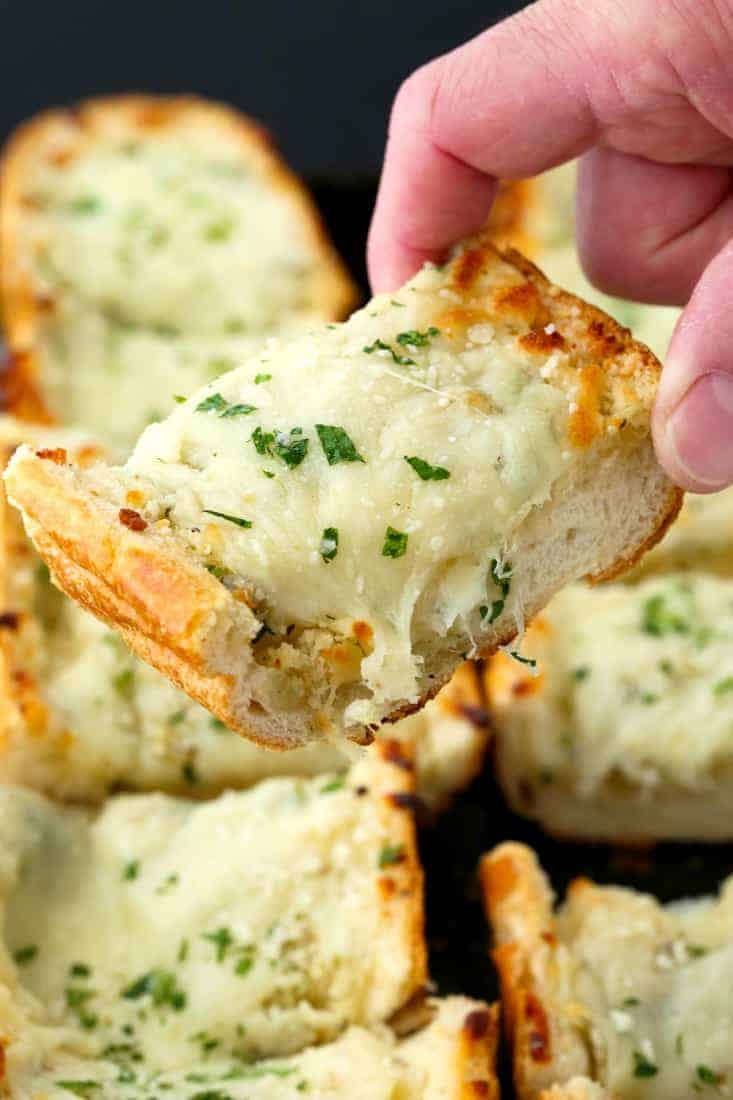 Easy Cheesy Garlic Bread is a cheese topped garlic bread made with fresh garlic and butter