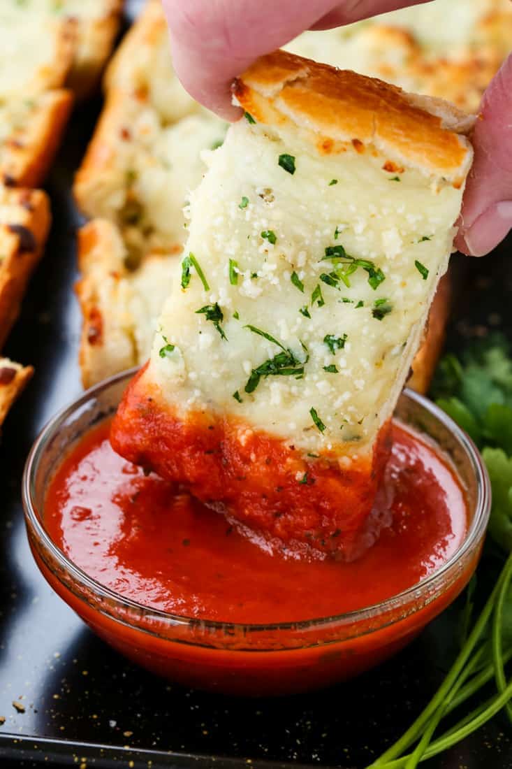 Easy Cheesy Garlic Bread is a cheese topped garlic bread that can be dipped in marinara sauce