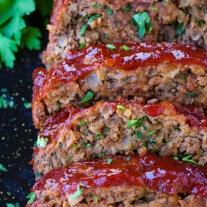glazed, slices of meatloaf with parsley