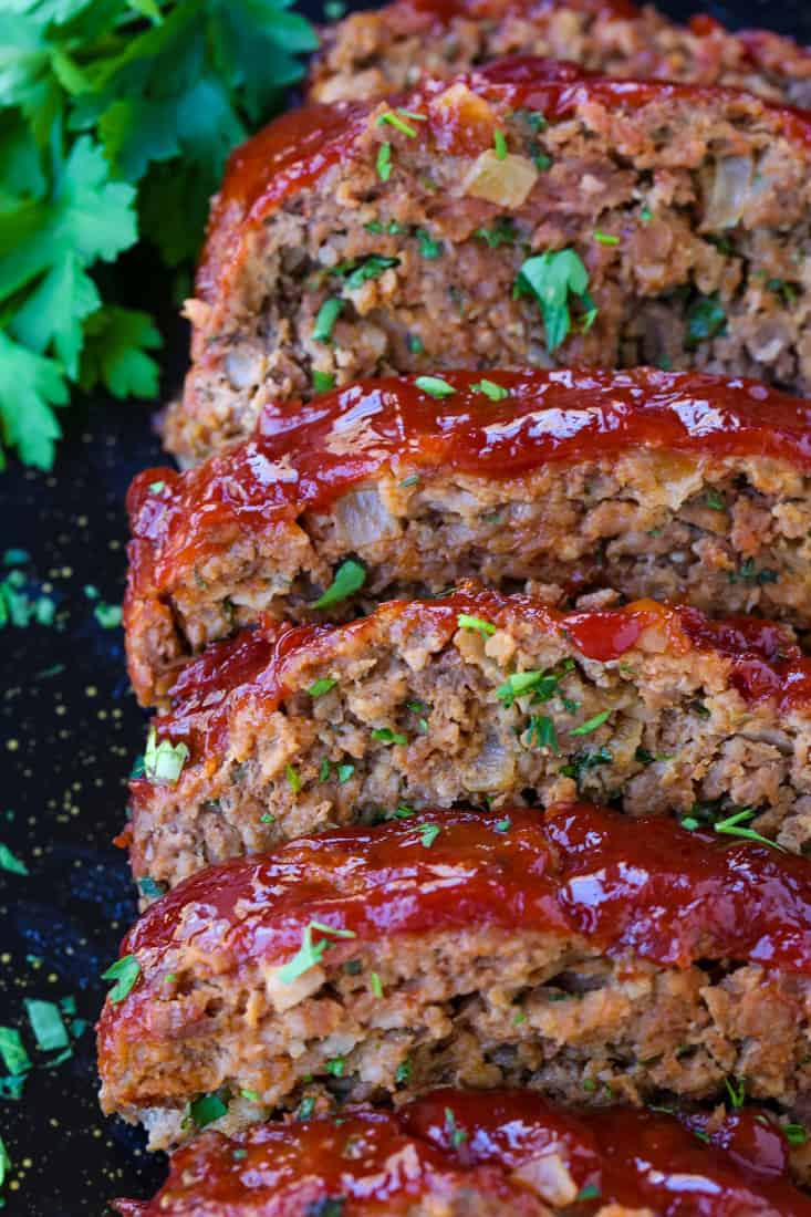 Sliced meatloaf with a ketchup based glaze