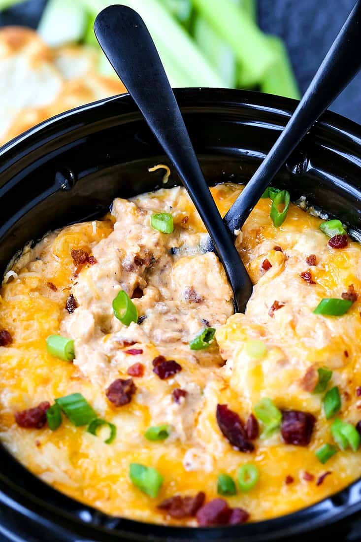 Crock Pot Buffalo Chicken Dip is a crock pot recipe with chicken, cheese and bacon