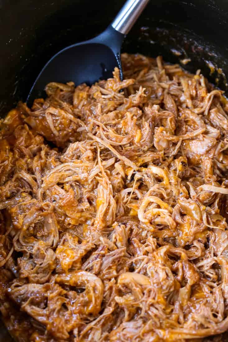 Cheesy BBQ Pulled Pork is a slow cooker pulled pork recipe with cheese and barbecue sauce