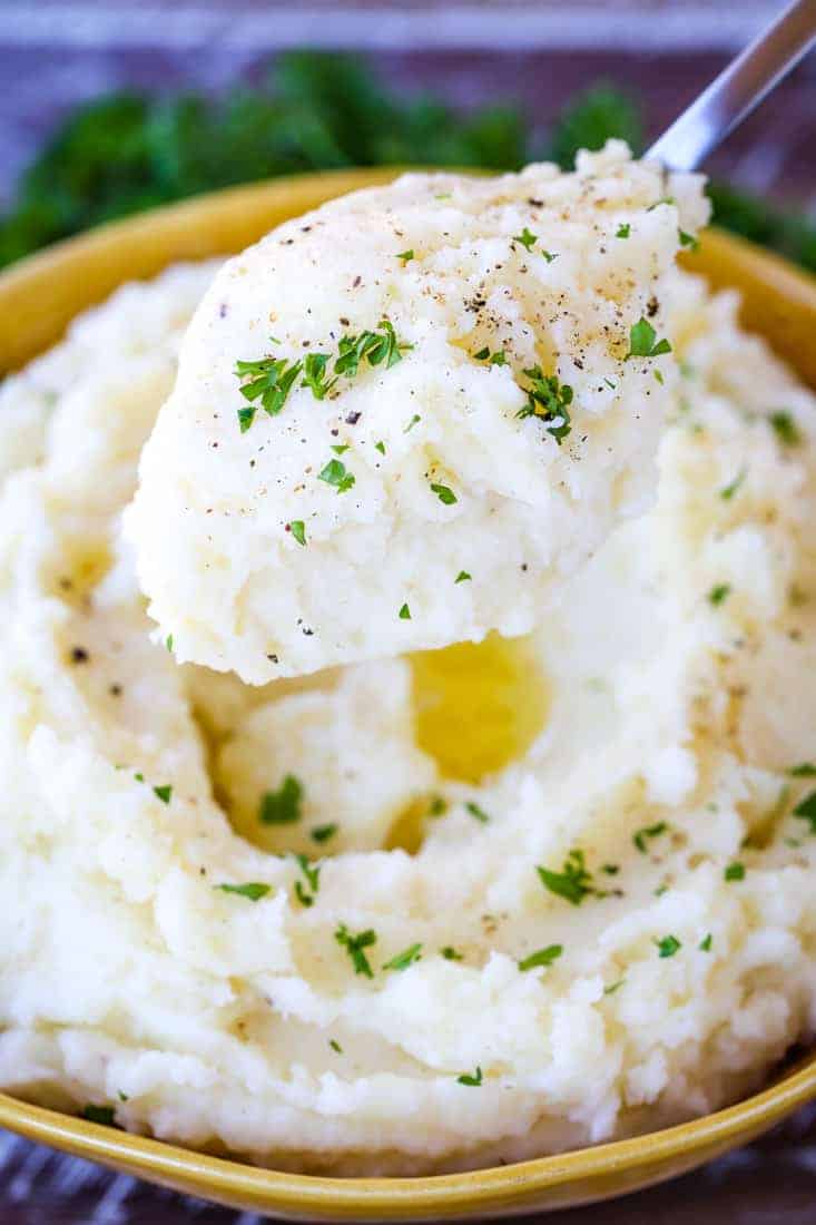 Perfectly Smooth Mashed Potatoes are riced potatoes whipped with butter and cream