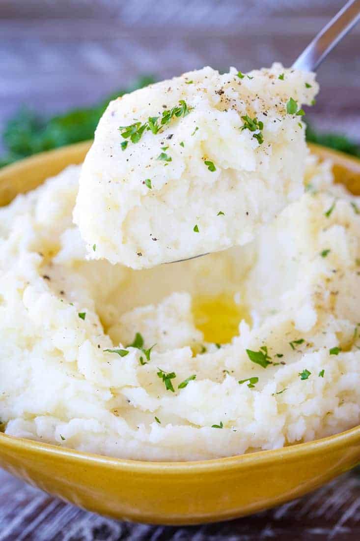 Perfectly Smooth Mashed Potatoes are the fluffiest mashed potato recipe ever!