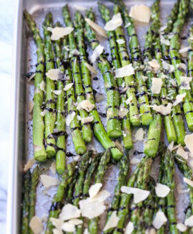 roasted asparagus drizzled with balsamic glaze and parmesan cheese