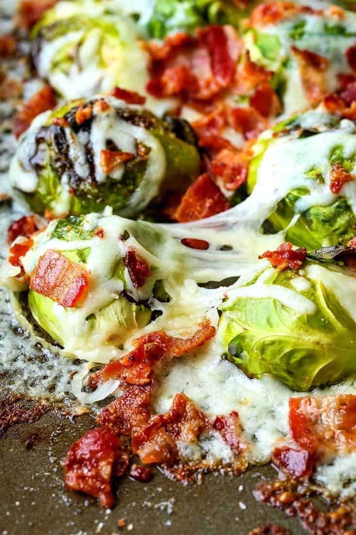 Loaded Sheet Pan Brussels Sprouts are a roasted brussels sprouts recipe with cheese and bacon