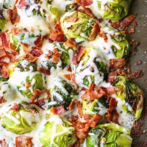 Loaded Sheet Pan Brussels Sprouts are a roasted brussels sprouts recipe topped with cheese and bacon