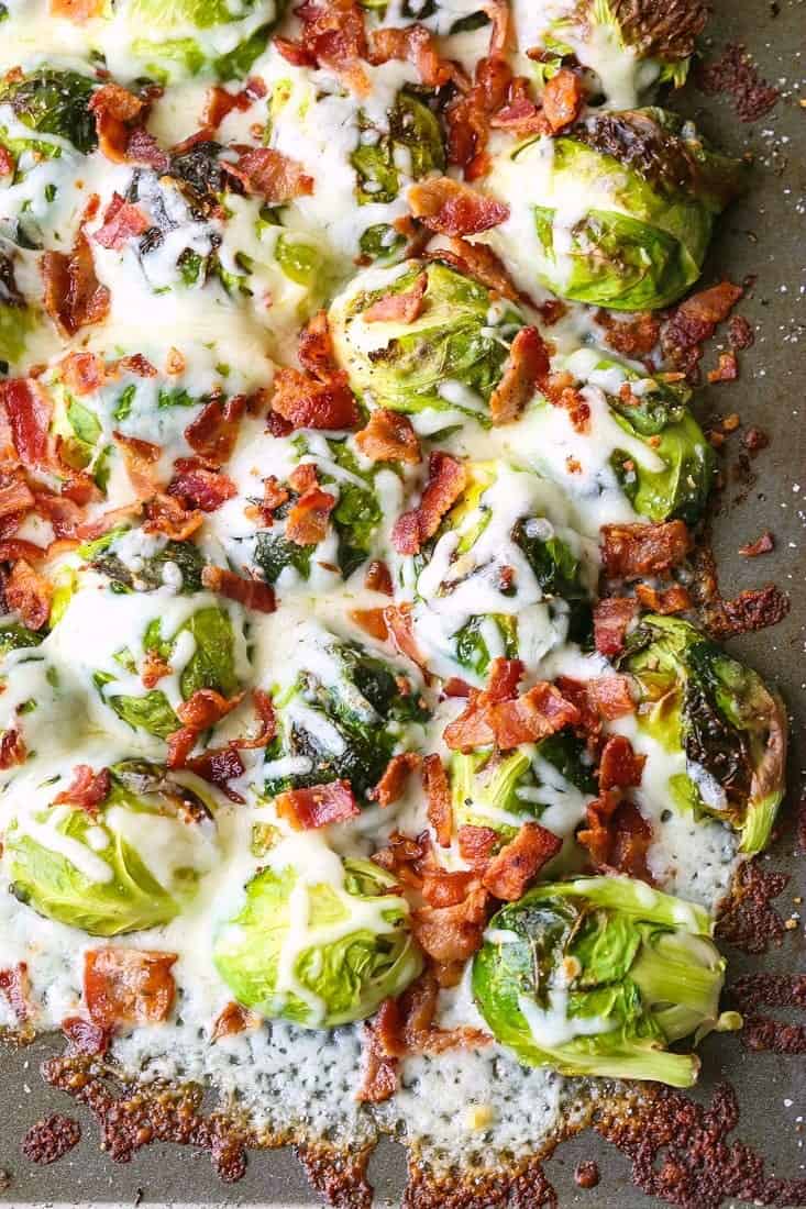 Loaded Sheet Pan Brussels Sprouts are a roasted brussels sprouts recipe topped with cheese and bacon