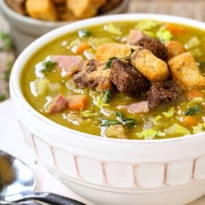 Stove Top Split Pea and Ham Soup is a soup recipe made with leftover ham and topped with croutons