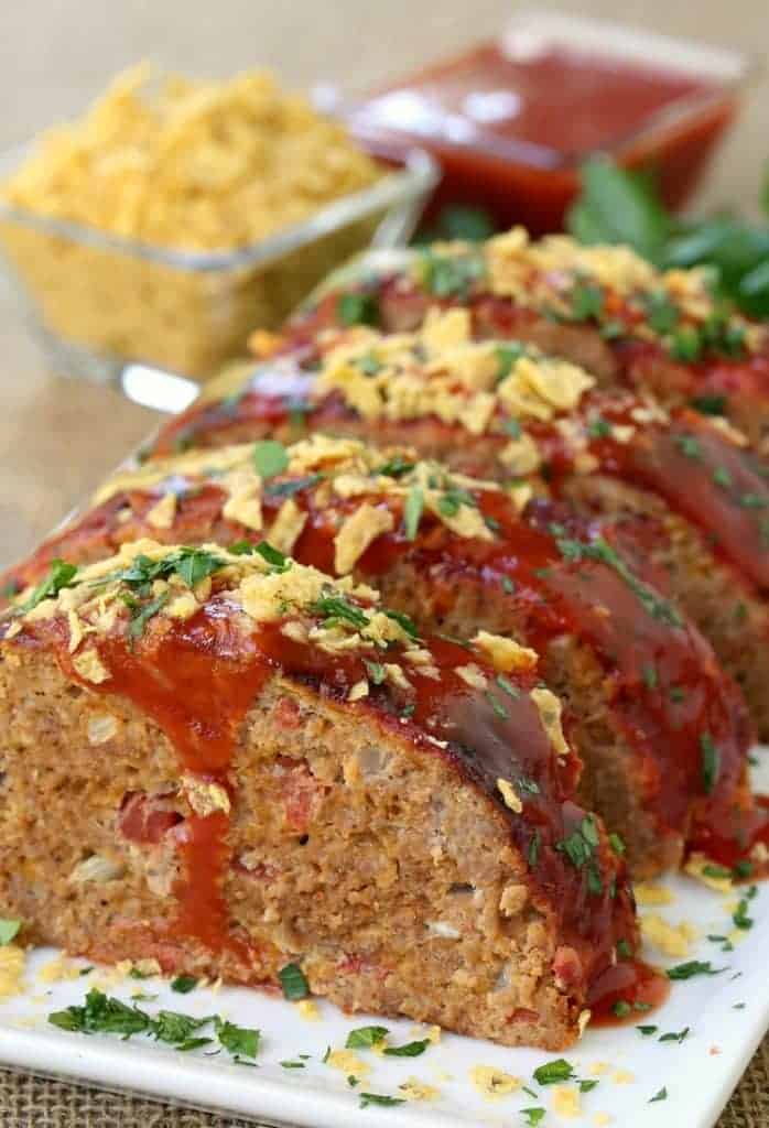 taco meatloaf sliced with chips on top