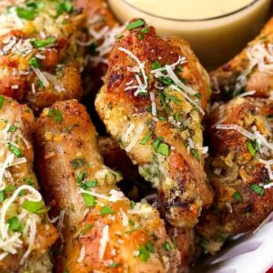 garlic parmesan chicken wings on platter