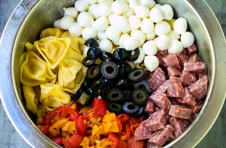 Italian Pasta Salad ingredients in a silver bowl