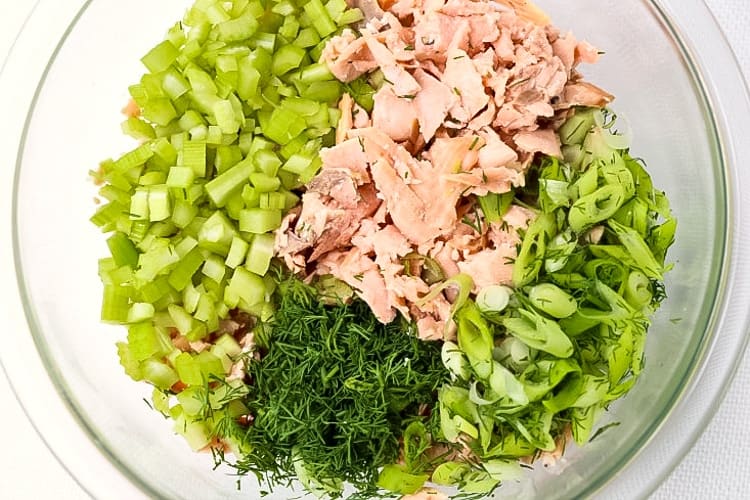 Salmon Salad Recipe uses fresh salmon and a few other ingredients mixed together in a bowl