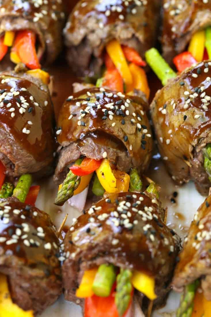 Asian Steak Roll Ups on a white platter